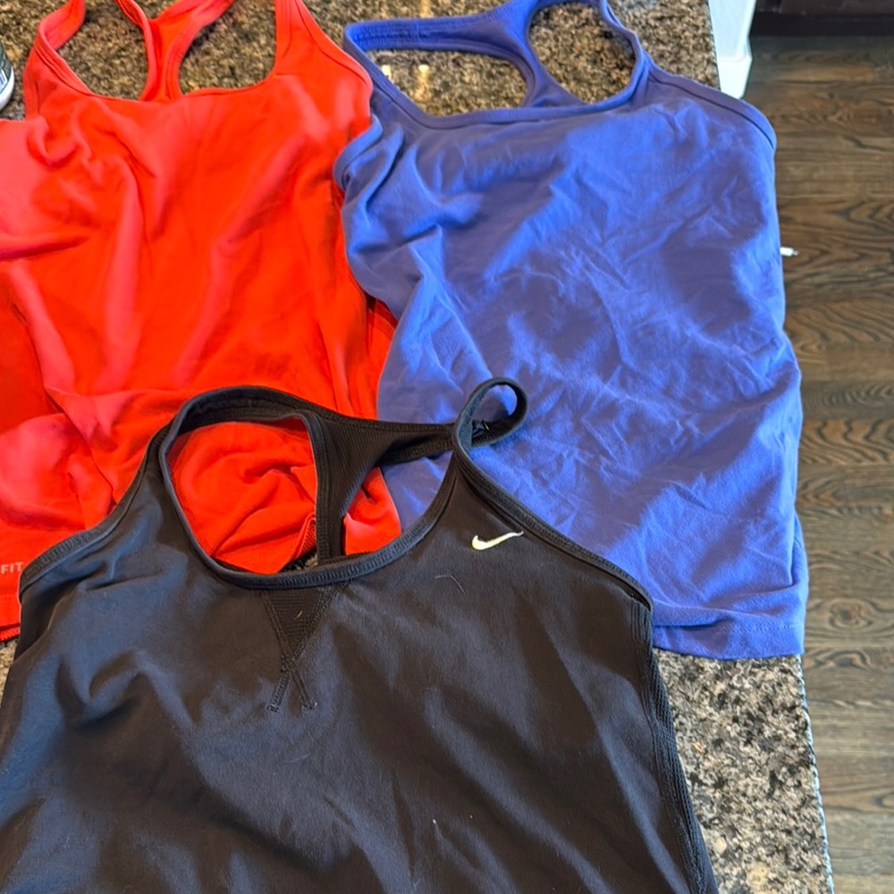 Nike Orange and purple, and black Fri-fit Athletic Tank Tops
